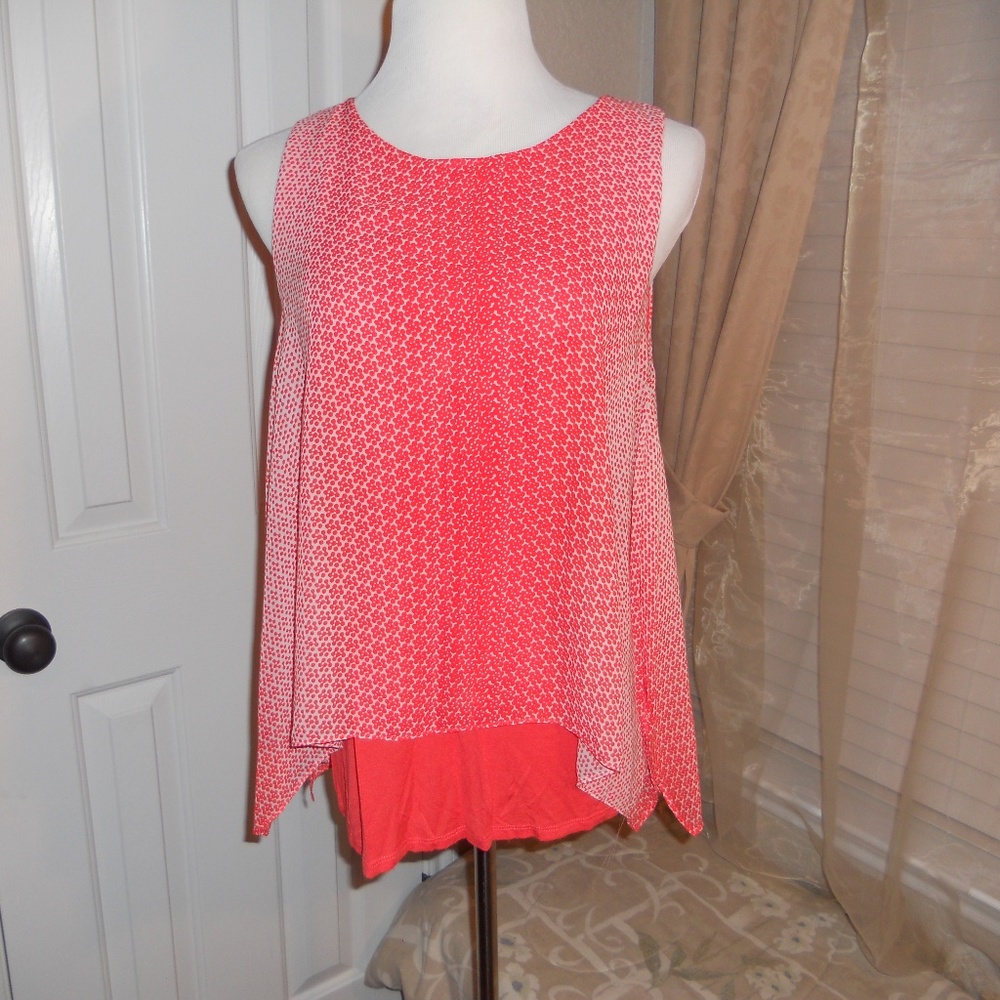 layered , sleeveless, orange shirt